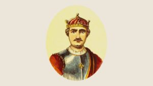 Hand-coloured oval portrait of William the Conqueror wearing a jewelled crown and armour.